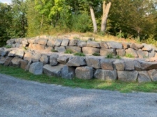 two tiered boulder retaining wall